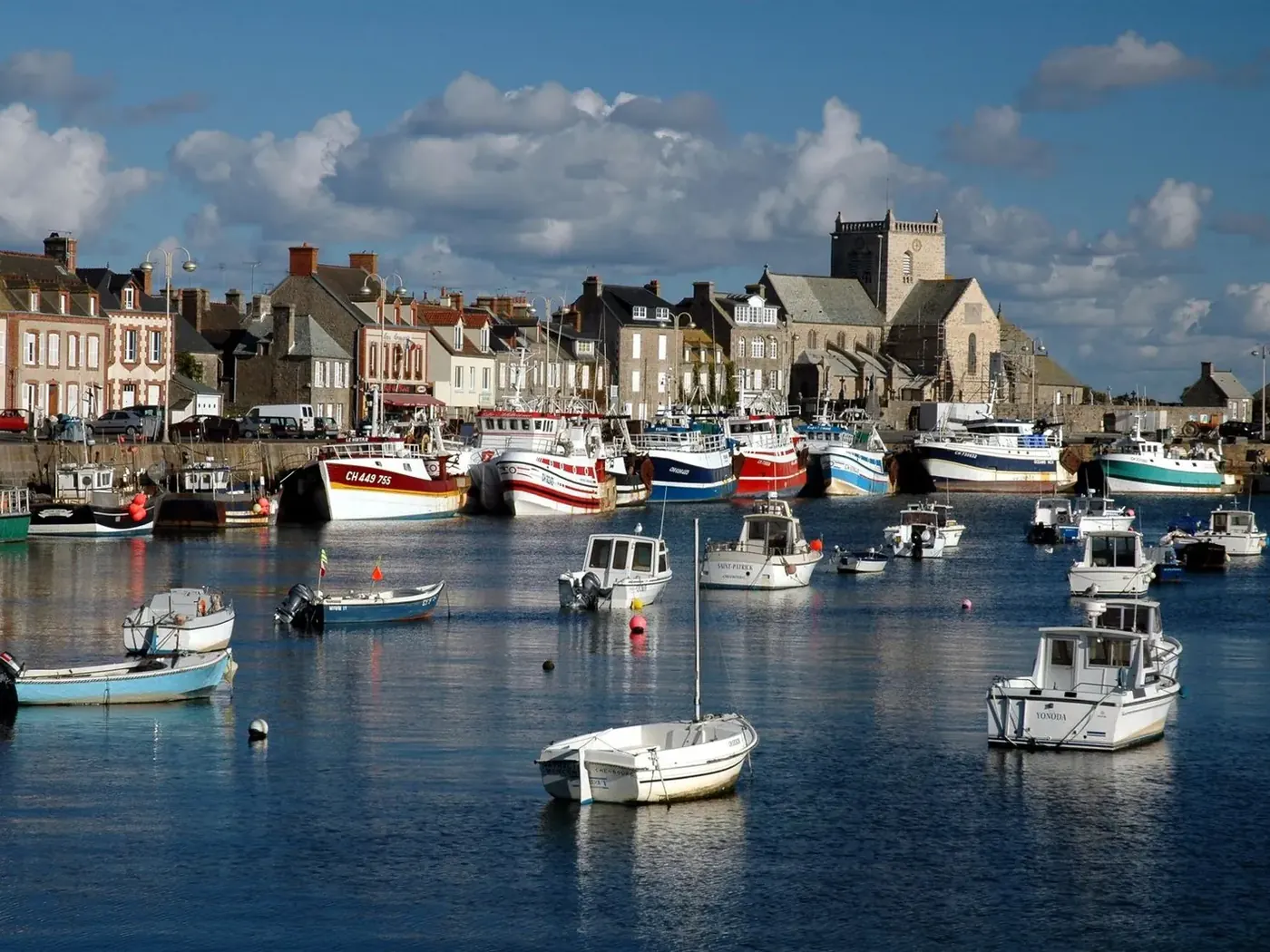 Barfleur fishing harbor and its Saint-Nicolas church